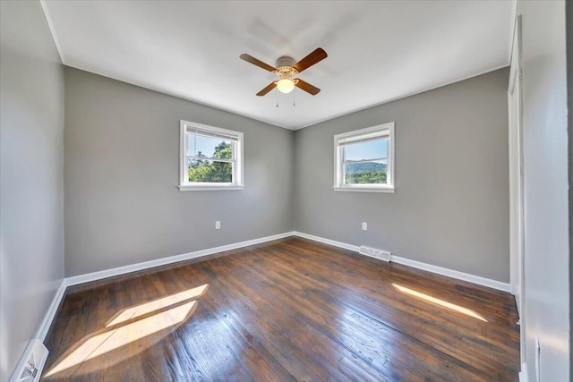 1104 Dolly Ann Dr, Covington, VA 24426 - empty room with plenty of natural light, a ceiling fan, and baseboards