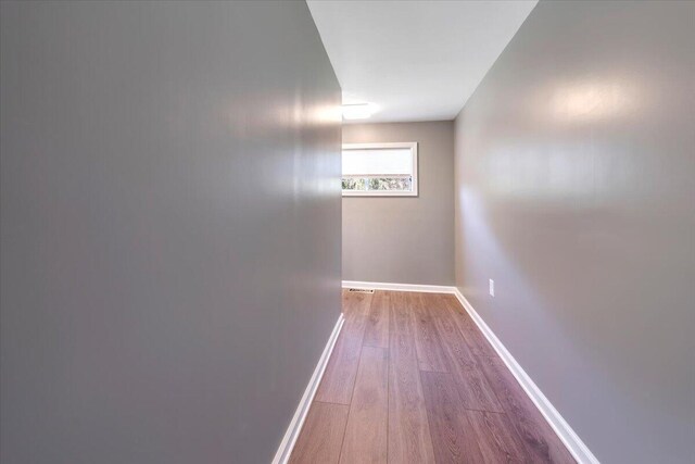 1104 Dolly Ann Dr, Covington, VA 24426 - corridor featuring wood finished floors and baseboards