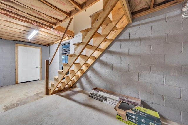 1104 Dolly Ann Dr, Covington, VA 24426 - unfinished below grade area with stairway and concrete block wall