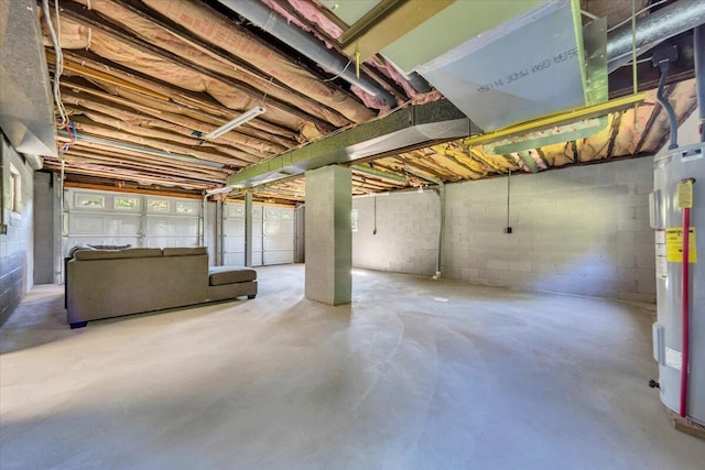 1104 Dolly Ann Dr, Covington, VA 24426 - unfinished below grade area with water heater and concrete block wall
