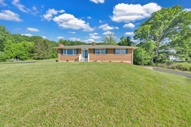 1104 Dolly Ann Dr, Covington, VA 24426 - ranch-style home with entry steps, brick siding, a chimney, a front yard, and asphalt driveway