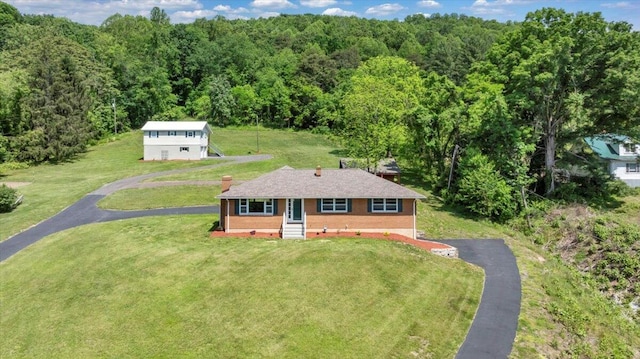 1104 Dolly Ann Dr, Covington, VA 24426 - aerial view of property and surrounding area with a heavily wooded area