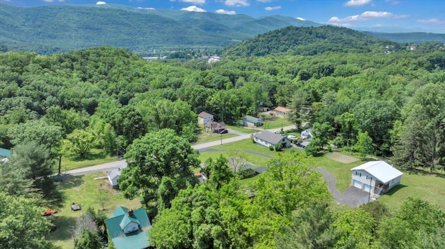 1104 Dolly Ann Dr, Covington, VA 24426 - drone / aerial view of a heavily wooded area and a mountain backdrop