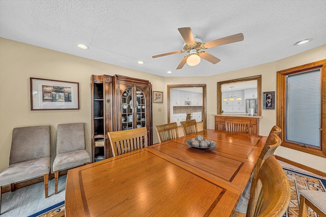 217 Anthony Home Rd, Huddleston, VA 24104 - dining room with a textured ceiling, a ceiling fan, recessed lighting, and baseboards
