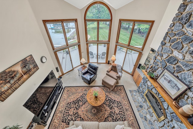 217 Anthony Home Rd, Huddleston, VA 24104 - living room featuring high vaulted ceiling and light colored carpet