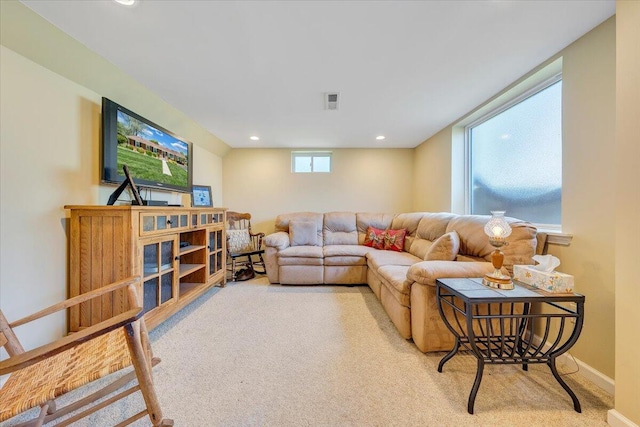 living area with carpet flooring, recessed lighting, and baseboards