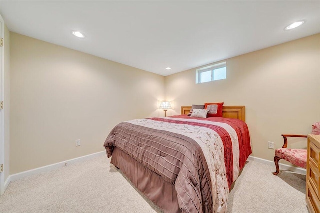 bedroom featuring light carpet, baseboards, and recessed lighting