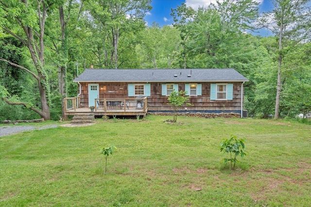 3003 Northridge Rd, Hardy, VA 24101 - view of front facade with a wooden deck, a wooded view, and a front lawn