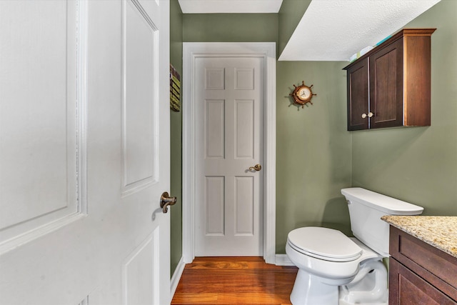 145 W Arrowhead Ct, Troutville, VA 24175 - bathroom with toilet, wood finished floors, vanity, and baseboards