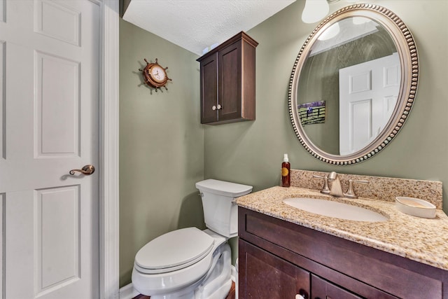 145 W Arrowhead Ct, Troutville, VA 24175 - half bath with vanity, toilet, and a textured ceiling