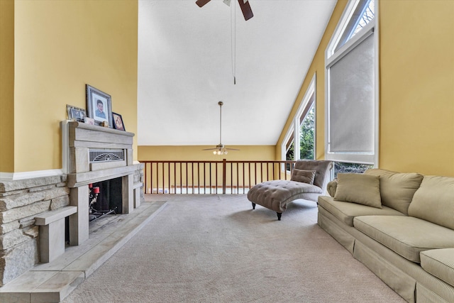 145 W Arrowhead Ct, Troutville, VA 24175 - living area featuring a ceiling fan, carpet floors, a fireplace with raised hearth, and high vaulted ceiling
