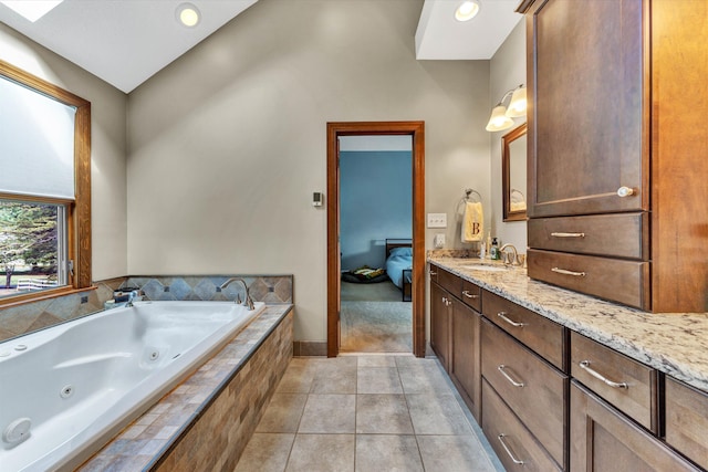 145 W Arrowhead Ct, Troutville, VA 24175 - bathroom with a whirlpool tub, vanity, connected bathroom, and tile patterned flooring
