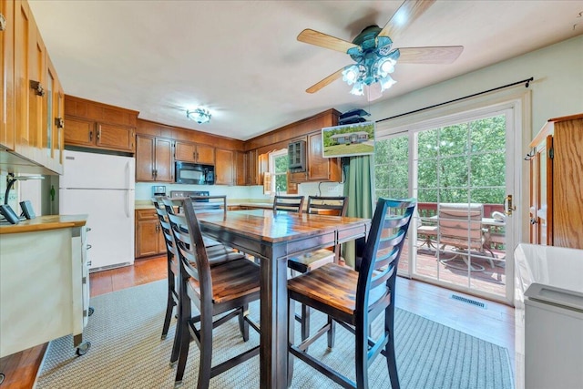 1793 Sandy Level Rd, Goodview, VA 24095 - dining area with a ceiling fan and light wood-style flooring