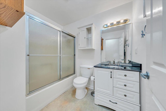 1793 Sandy Level Rd, Goodview, VA 24095 - full bath with toilet, vanity, bath / shower combo with glass door, and tile patterned floors