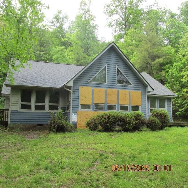 56 Craig Woods Rd, New Castle, VA 24127 - view of front of home featuring roof with shingles and a front lawn
