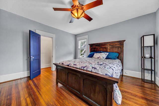2102 Berkley Ave SW, Roanoke, VA 24015 - bedroom with wood-type flooring, baseboards, and ceiling fan