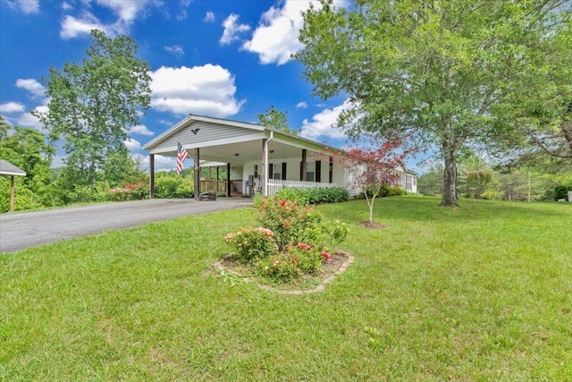 1320 Horseshoe Point Rd, Henry, VA 24102 - view of front of home with asphalt driveway, a front yard, and a carport