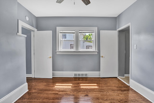 1228 Thomas Ave NW, Roanoke, VA 24017 - spare room featuring ceiling fan, wood finished floors, and baseboards