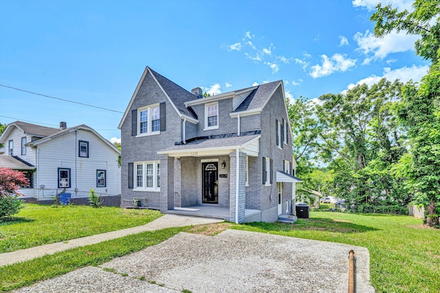 1228 Thomas Ave NW, Roanoke, VA 24017 - view of front of home with central AC, a shingled roof, and brick siding