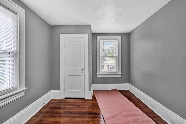 1228 Thomas Ave NW, Roanoke, VA 24017 - doorway to outside with dark wood-type flooring and baseboards