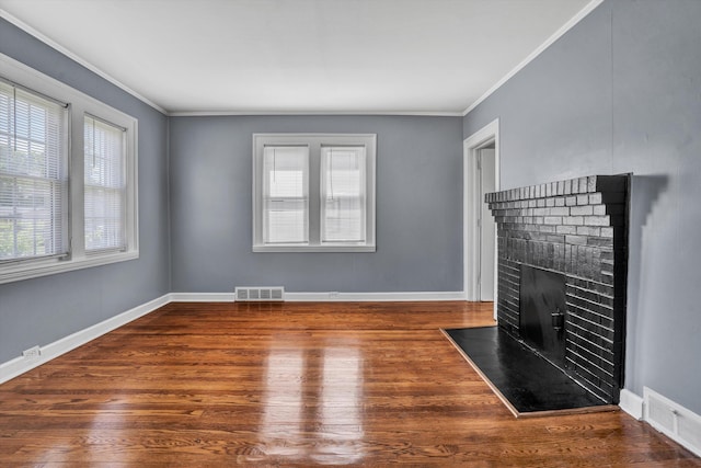 1228 Thomas Ave NW, Roanoke, VA 24017 - unfurnished living room with a fireplace, crown molding, wood finished floors, and baseboards