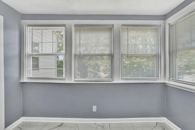 1228 Thomas Ave NW, Roanoke, VA 24017 - unfurnished room with marble finish flooring and baseboards
