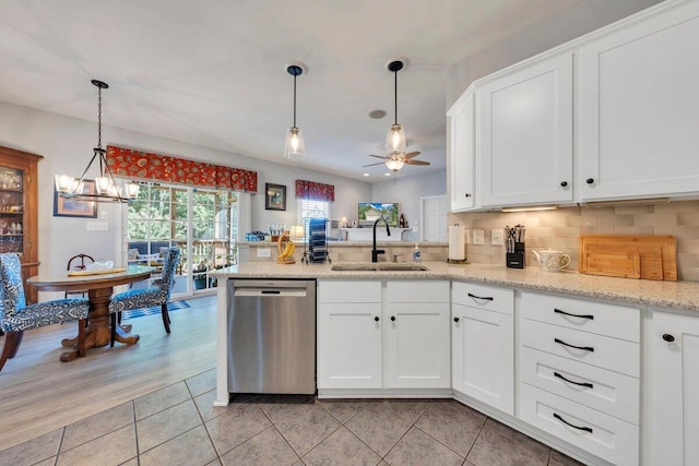 1017 Joffrey Dr, Huddleston, VA 24104 - kitchen featuring dishwasher, a sink, ceiling fan, a peninsula, and white cabinetry
