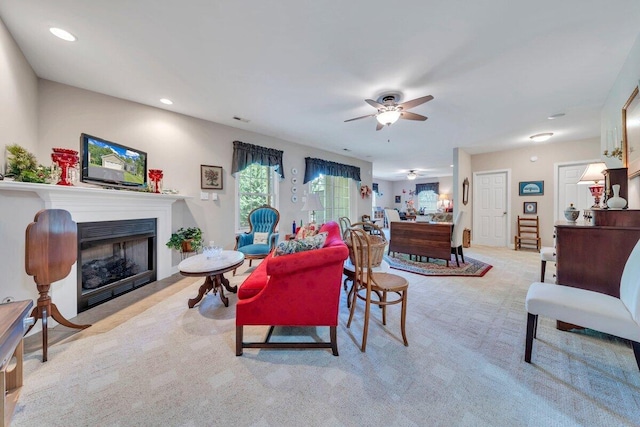 1017 Joffrey Dr, Huddleston, VA 24104 - living room featuring ceiling fan, light carpet, a fireplace, and recessed lighting