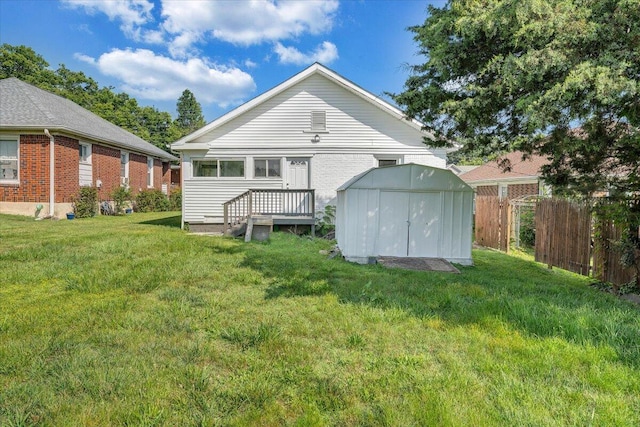 1008 Primrose St SE, Roanoke, VA 24014 - rear view of property featuring a storage shed and brick siding