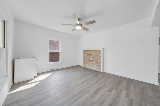 1008 Primrose St SE, Roanoke, VA 24014 - unfurnished room with a ceiling fan and wood finished floors