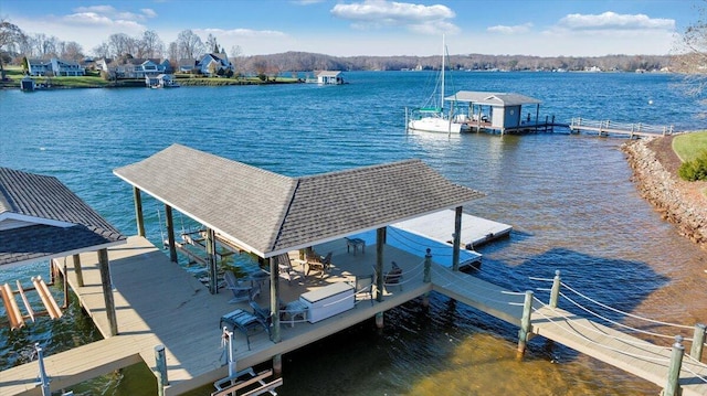 95 Shoreline Cir, Penhook, VA 24137 - dock with boat lift and a water view