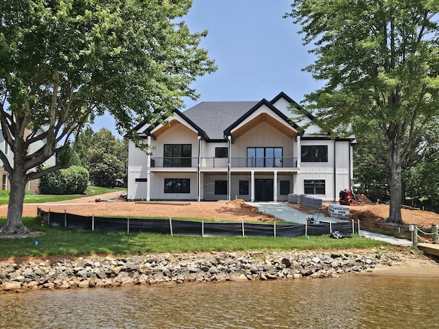 95 Shoreline Cir, Penhook, VA 24137 - back of house featuring a balcony, a fenced backyard, a water view, and a patio area