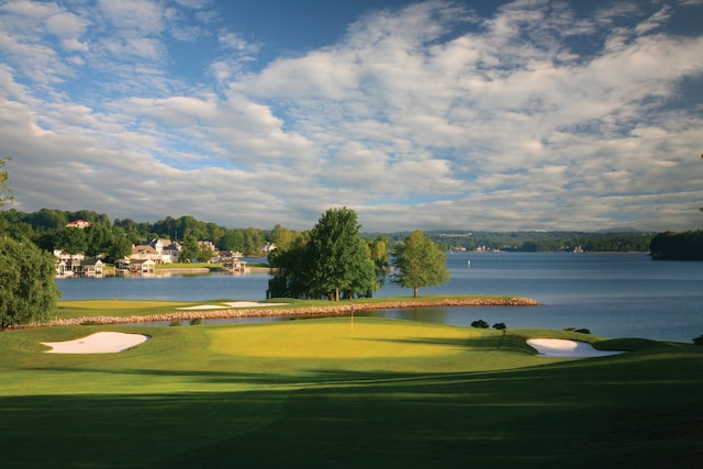 95 Shoreline Cir, Penhook, VA 24137 - view of community featuring a water view, golf course view, a yard, and an area to practice putting