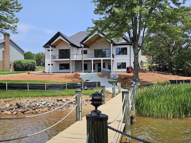 95 Shoreline Cir, Penhook, VA 24137 - dock featuring a balcony, a patio area, and a water view