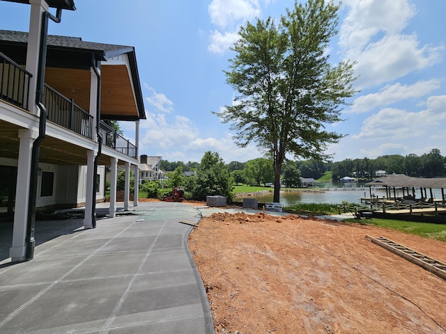 95 Shoreline Cir, Penhook, VA 24137 - view of yard featuring a water view and a patio area