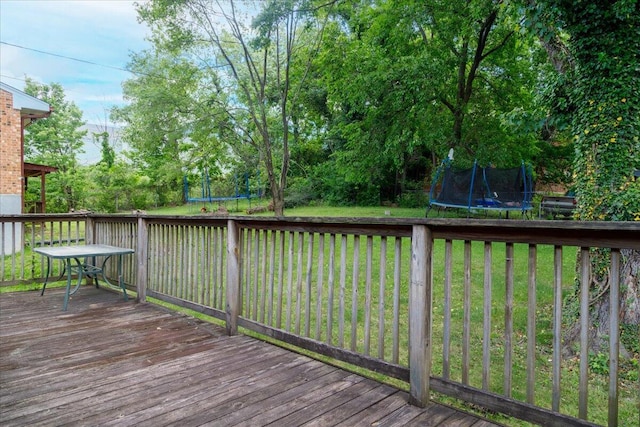 1829 Court St NW, Roanoke, VA 24012 - wooden deck featuring a trampoline and a yard