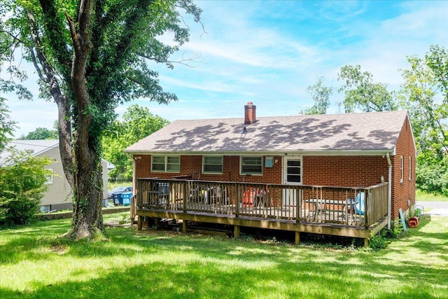 1829 Court St NW, Roanoke, VA 24012 - rear view of house with a chimney, a wooden deck, and a lawn