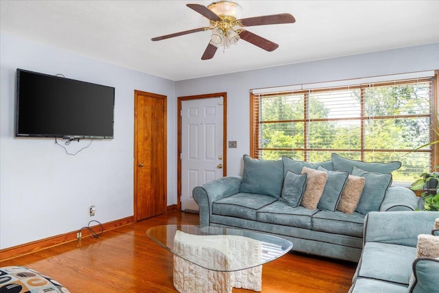 1829 Court St NW, Roanoke, VA 24012 - living area featuring wood finished floors, baseboards, and ceiling fan