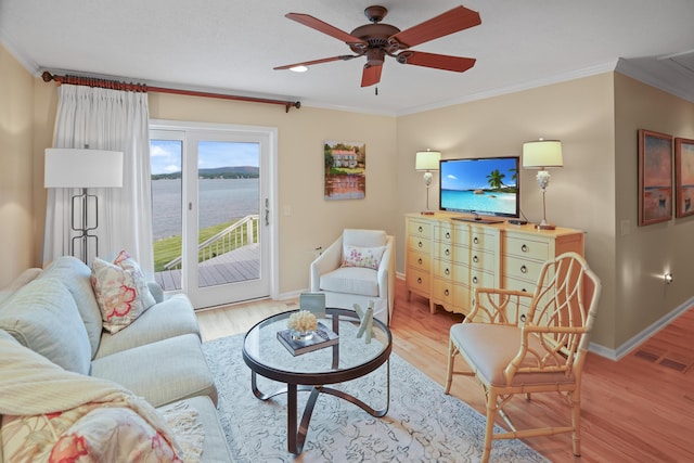 392 Carrs Point Ln, Moneta, VA 24121 - living room with ornamental molding, baseboards, ceiling fan, and light wood finished floors