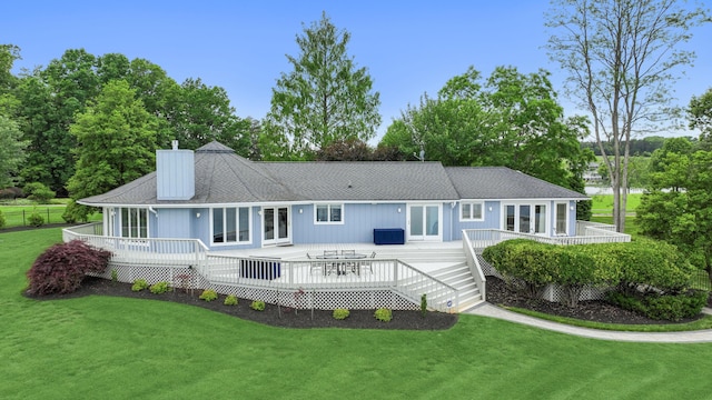 392 Carrs Point Ln, Moneta, VA 24121 - back of property with french doors, a lawn, and a wooden deck