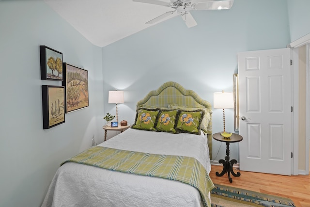 392 Carrs Point Ln, Moneta, VA 24121 - bedroom with wood finished floors, a ceiling fan, and lofted ceiling