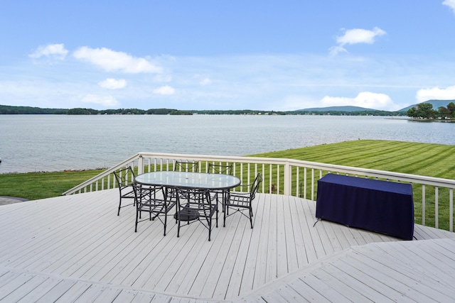 392 Carrs Point Ln, Moneta, VA 24121 - deck featuring a water and mountain view, outdoor dining area, and a lawn
