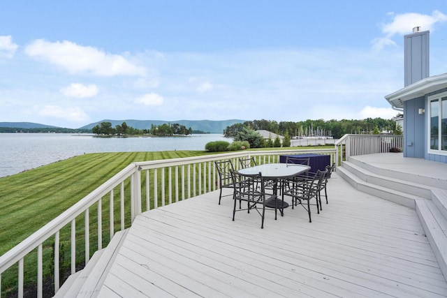 392 Carrs Point Ln, Moneta, VA 24121 - wooden deck with a water and mountain view, a yard, and outdoor dining area