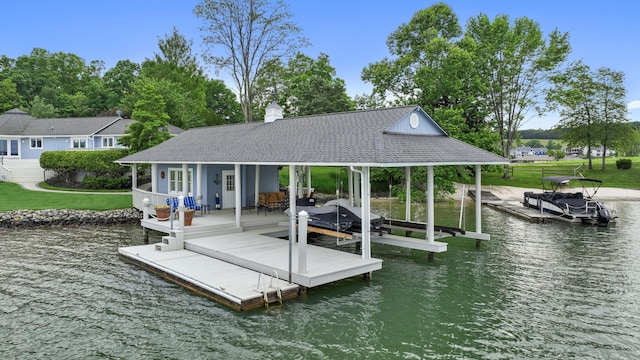 392 Carrs Point Ln, Moneta, VA 24121 - dock featuring boat lift, a water view, and a lawn