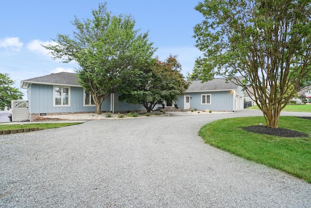 392 Carrs Point Ln, Moneta, VA 24121 - view of front of home featuring curved driveway, roof with shingles, crawl space, and a front lawn