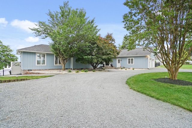 392 Carrs Point Ln, Moneta, VA 24121 - view of front of home featuring curved driveway, roof with shingles, crawl space, and a front lawn