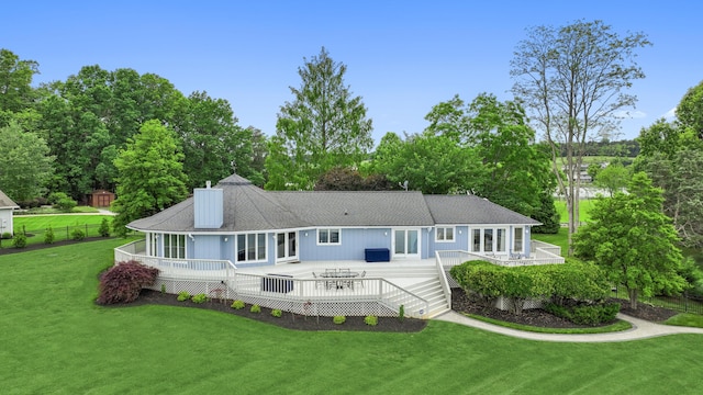 392 Carrs Point Ln, Moneta, VA 24121 - back of house featuring a chimney, a deck, and view of wooded area