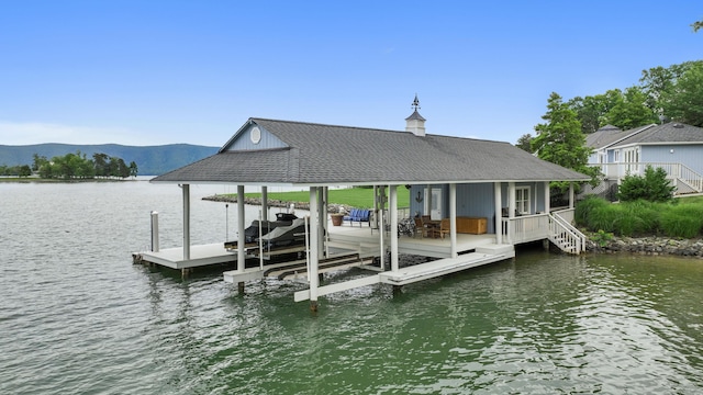 392 Carrs Point Ln, Moneta, VA 24121 - dock area featuring boat lift and a water and mountain view