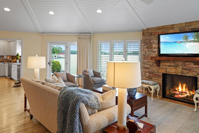 392 Carrs Point Ln, Moneta, VA 24121 - living room featuring light wood finished floors, recessed lighting, a stone fireplace, and wooden ceiling