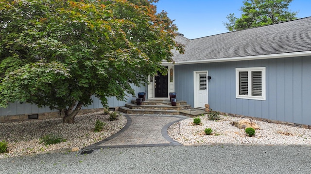 392 Carrs Point Ln, Moneta, VA 24121 - view of exterior entry with roof with shingles